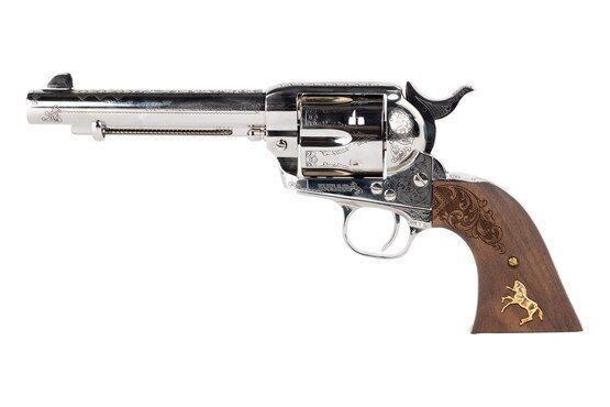 This revolver features gold inlay.